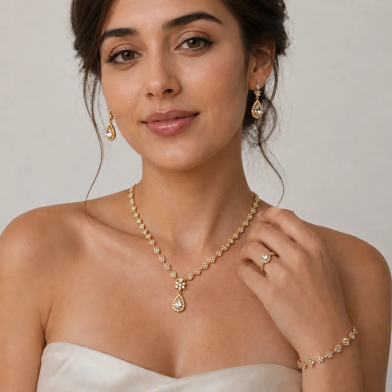 Monoshoot jewelry studio preview showing a model wearing a necklace, earrings, bracelet, and ring