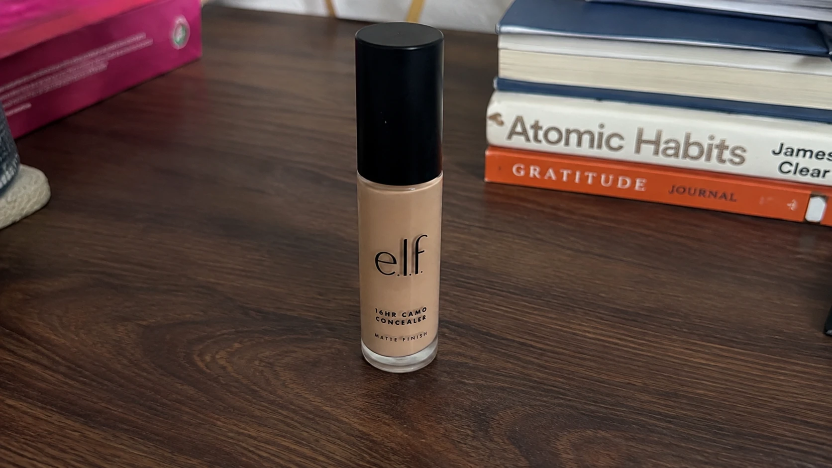 Raw photo of concealer wand on counter