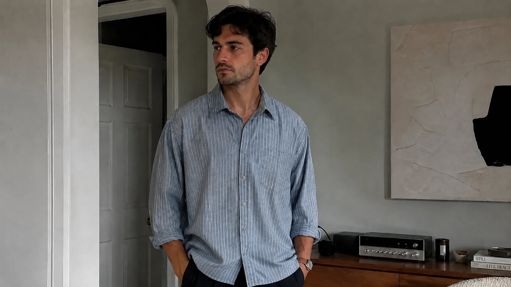 Studio-grade AI on-model photoshoot of casual shirt with preserved fabric drape and commercial lighting