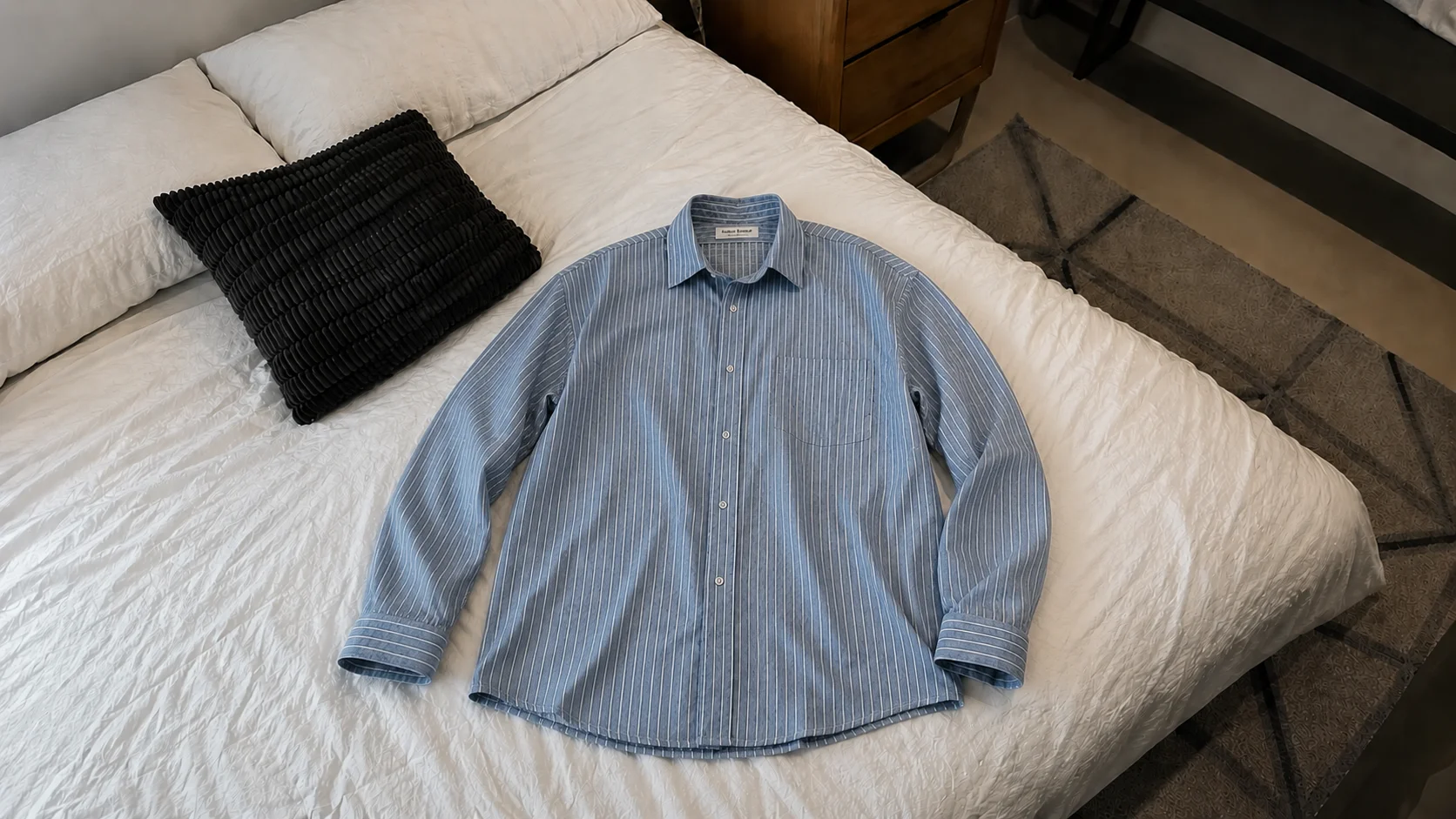 Raw smartphone flat lay of casual shirt before AI photoshoot processing